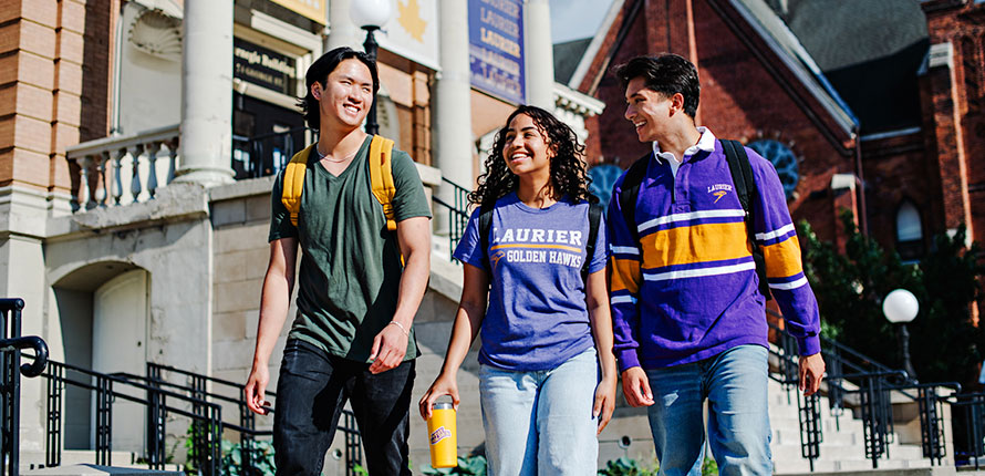 students walking outside Carnegie Building