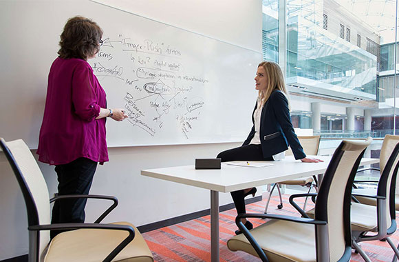 Two female business researchers