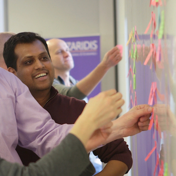 students working at whiteboard