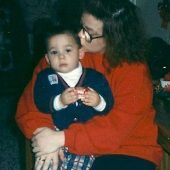 Zach Scotto as a toddler with his mother Loraine next to handwritten note.