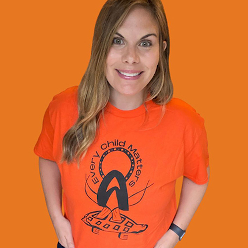 Maggie Allen wearing an Every Child Matters orange shirt