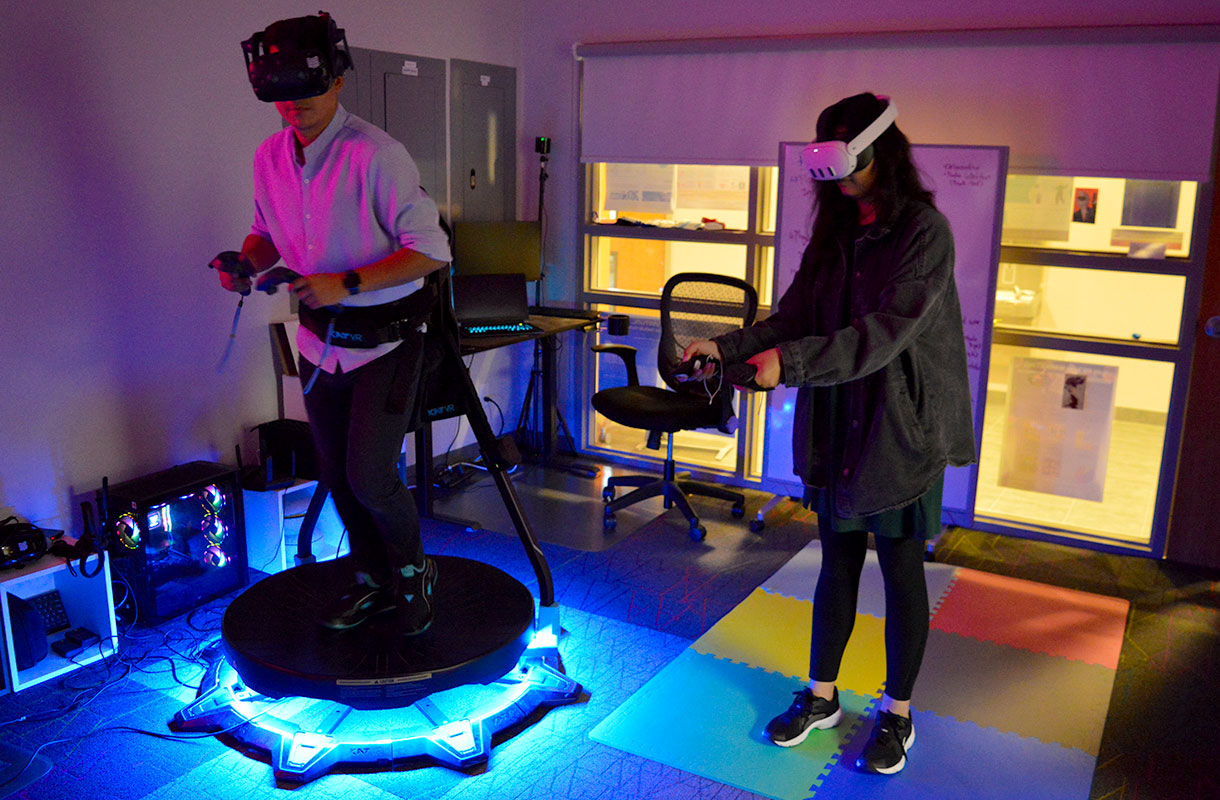 John Munoz and Muntaha Chaudry playing virtual reality games