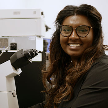 girl at microscope