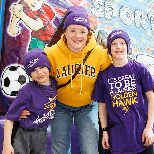 Family at Laurier Brantford Purple and Gold Party