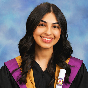 student with black hair and rolled diploma